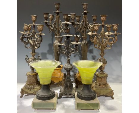 A pair of Rococo style gilt metal garniture, each as four branch, five light candelabra, 48cm high; another pair, Art Nouveau