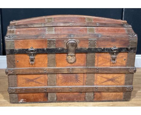 An American domed steamer trunk, by the Eagle Lock Company, Terryville, Connecticut, hinged top enclosing a removable tray, c