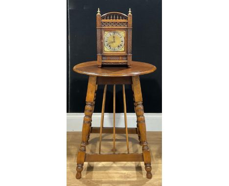 A German Black Forest oak mantel clock, Winterhalder &amp; Hofmeier, 37.5cm high; a mahogany centre table, in the manner of E