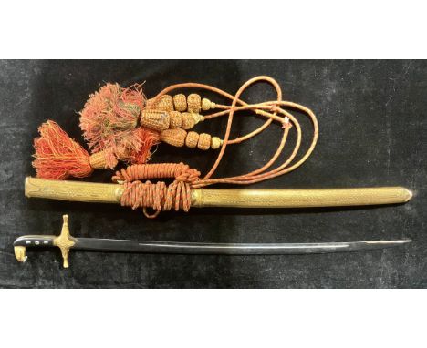 A Saudi Arabian ceremonial dress sword, gilt metal scabbard, decorated hilt and pommel. 90cm long. 