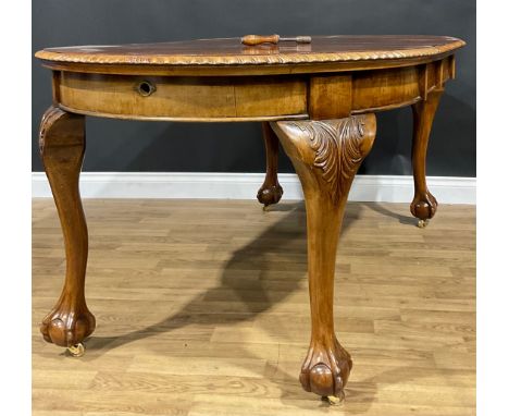 A George II style mahogany extending dining table, two additional leaves, 77.5cm high, 111cm extending to 179cm long, 106cm w