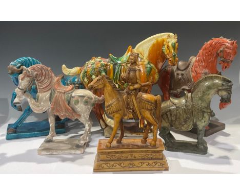 A Chinese Tang Dynasty style model of a horse, 27cm high; an Italian Majolica Tang style model of a horse, turquoise glazed, 