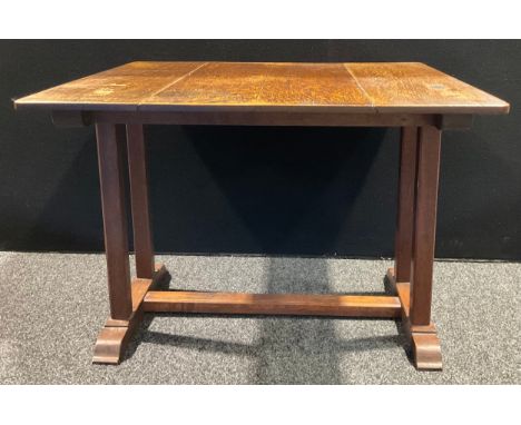 An early 20th century oak refectory dining table, 73cm high, 102cm long, 90.5cm wide 