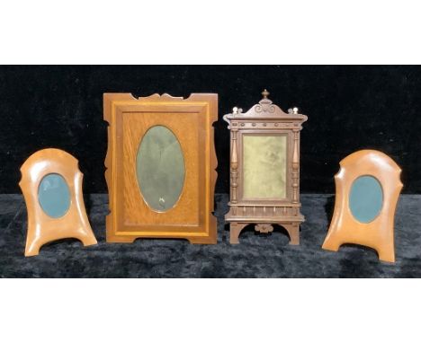 A late 19th century mahogany architectural easel photograph frame, turned bone finials, 31cm x 16cm; an Edwardian Mahogany in