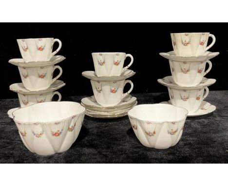 A Foley Wileman tea set comprising eight breakfast teacups, twelve saucers, slop bowl and sugar bowl, pattern number 10318, r