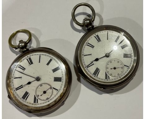 A silver open faced pocket watch, marked Fine Silver; another (2) 