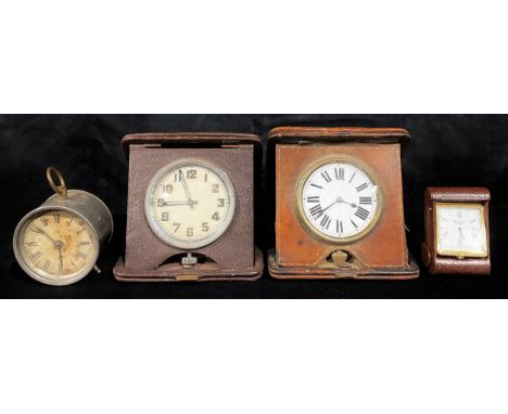 A leather cased travelling clock, early 20th century; another, c.1930; a miniature Jean Roulet travelling clock; an American 