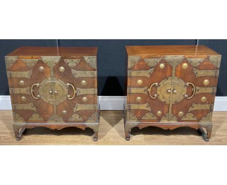 A pair of Chinese brass-mounted table cabinets, yumu veneered doors, 58.5cm high, 57cm wide, 29cm deep (2) 