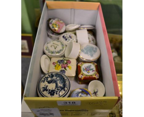 A small collection of Royal Worcester and other enamel and porcelain trinket boxes