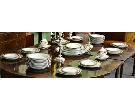 A Royal Worcester China Works part dinner service with cobalt blue and gilt borders