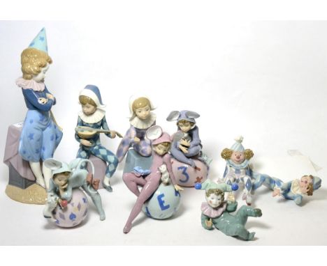 Eight Lladro clown figures and one Nao