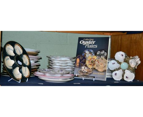 A collection of oyster plates including Quimper, Limoges, Doulton & Sarreguemines & Crown Devon examples, mostly 20th century