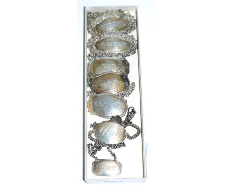 A George III silver port label, together with a further seven decanter labels of various dates and makers