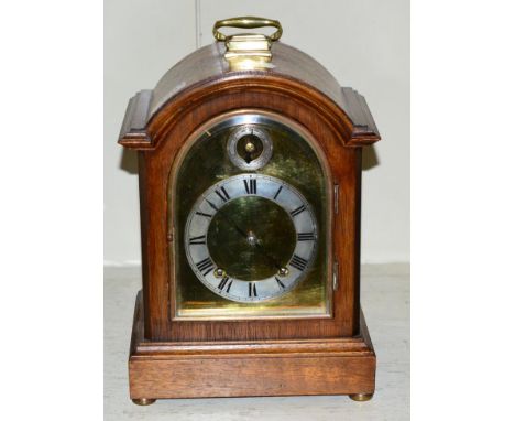 A mahogany cased chiming mantel clock 