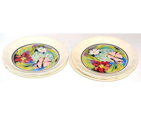 A set of six Clarice Cliff Bizarre plates, designed by M.J.Riach, each decorated with flowers within black bands, factory mar