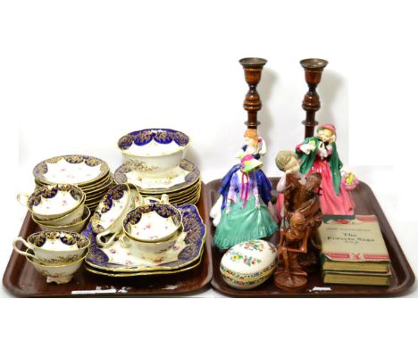 A Cauldon blue, gilt and floral decorated part tea service, together with a pair of turned wooden candlesticks, Royal Doulton