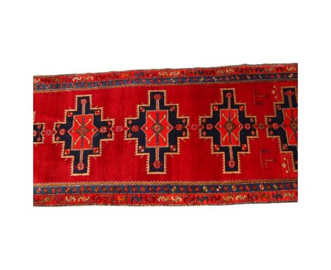A Persian Tafesh runner, with repeat octagonal medallions, 390 x 125cm 