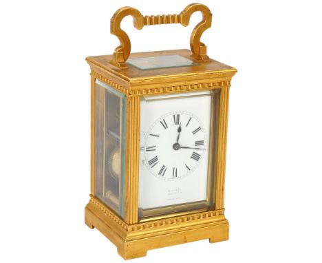 A French gilt-brass cased carriage clock, 8-day movement striking on a gong, retailer's Roberts of Leamington, case height 14