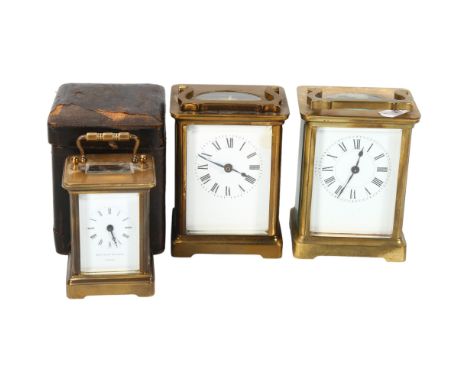 Miniature brass carriage clock, by Matthew Norman of London, case height 8cm, in leather travelling case, together with 2 oth