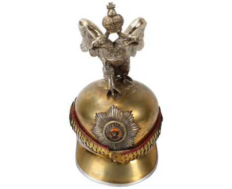 **DESCRIPTION CHANGE**A rare 19th century *Russian* eagle pickelhaube helmet with enamel decorated badge, scale chin strap an