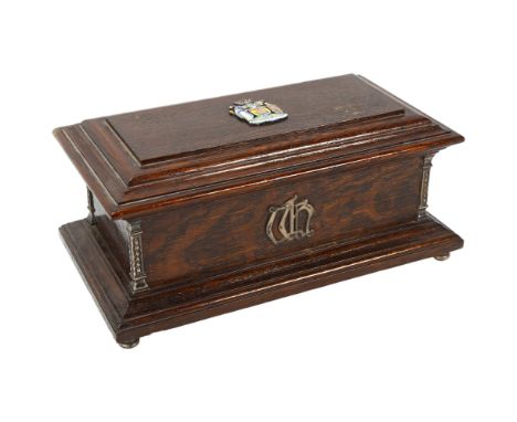 A Freedom scroll for the Borough of Folkestone 1958, in oak casket with enamel crest to the lid, casket length 28cmAll in goo