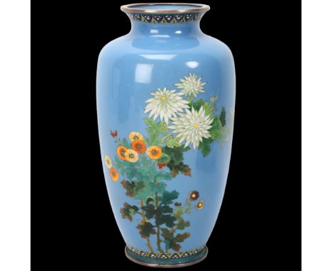 Japanese Meiji Period silver wire cloisonne enamel vase, with fine floral decoration on pale blue ground, height 18cmAll in p