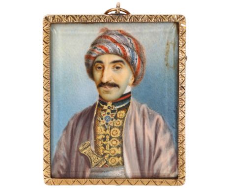 19th century miniature watercolour portrait on ivory, depicting a Persian man wearing a turban and dagger, gilded highlights,