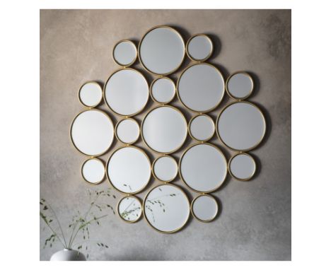 Wallis Circles Mirror The mirror is made up of individual round mirrors combined together to create a dramatic look set in a 