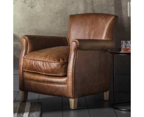 Mr. Paddington Chair Vintage Brown Leather  The Mr. Paddington chair is full of personality with his curved welcoming classic