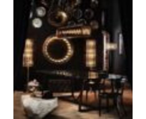 Inception Scone The Inception Scone wall lamp by Timothy Oulton is inspired by the infinite mirrors from the 70s. This specia