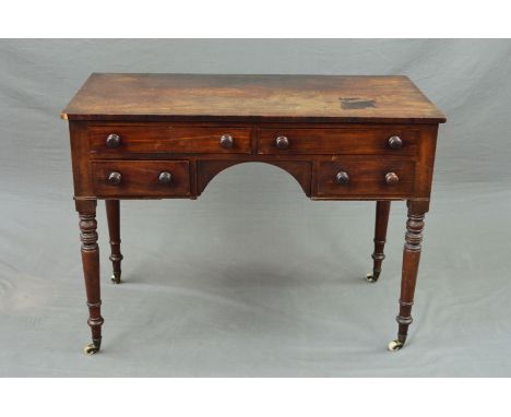 AN EARLY VICTORIAN MAHOGANY DRESSING TABLE, the rectangular top above an arrangement of four frieze drawers with turned handl