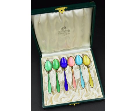 A CASED SET OF SIX KRISTIAN HESTENES OF NORWAY HARLEQUIN ENAMELLED COFFEE SPOONS, stamped Sterling, approximate gross weight 