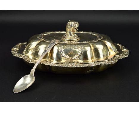 A GEORGE IV SILVER ENTREE DISH AND COVER, leopard's head finial over a shaped rectangular cover and base with foliate cast bo