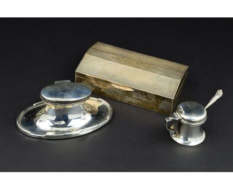 A GEORGE VI SILVER CIGARETTE BOX, shaped rectangular form, engine turned hinged cover with inscription to cartouche and engra