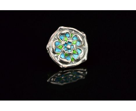 AN EARLY 20TH CENTURY W.H. HASELER CIRCULAR ENAMELLED FLORAL DESIGN BROOCH, in blue and green enamel, measuring approximately