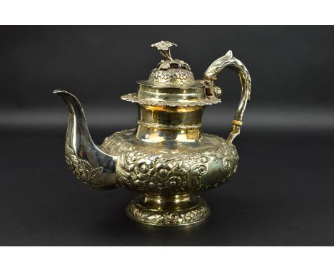 AN EARLY 19TH CENTURY PROVINCIAL IRISH COFFEE POT, bearing the marks of Cork Silversmith Kean Mahony (Mahoney), cast flower a