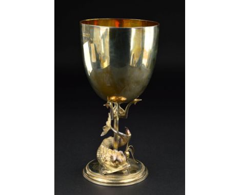 A VICTORIAN SILVER AND SILVER GILT GOBLET, circular bowl on a trident pedestal, encircled by a fish and foliage above a beade