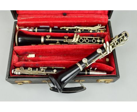 A SELMER STERLING CLARINET SERIAL NO. 166850, with white metal mounts, together with another Selmer Sterling clarinet, one se
