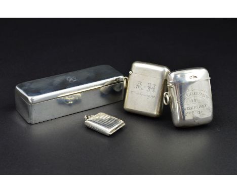 A LATE VICTORIAN SILVER RECTANGULAR TRINKET BOX, the hinged cover engraved with monogram, gilt interior, maker E.H.W., London