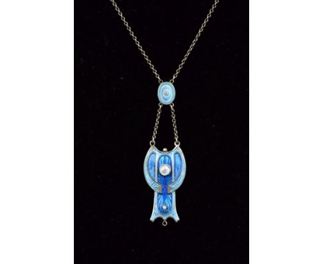 AN ART NOUVEAU CHARLES HORNER SILVER ENAMELLED PENDANT, inlaid with blue enamel and mother of pearl, measuring approximately 