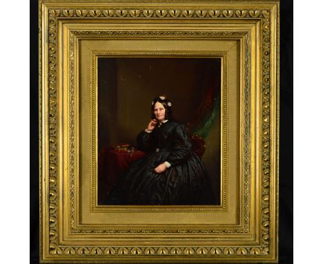 19TH CENTURY BRITISH SCHOOL, three quarter portrait of a lady seated at a table, oil on board, approximately 28.5cm x 23.5cmC