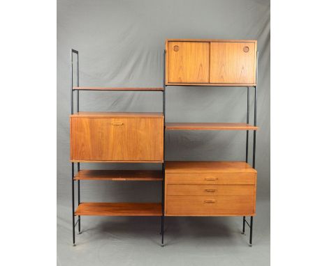 AN AVALON TEAK TWO BAY FREESTANDING ROOM DIVIDING SHELVING SYSTEM, comprising of three metal uprights, chest of three long dr