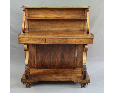 A REGENCY ROSEWOOD, ROSEWOOD STAINED AND BRASS INLAID BUFFET, pierced brass gallery to top tier on 'S' scroll and brass colum