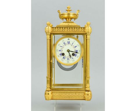 A LATE 19TH CENTURY FRENCH ORMOLU AND FOUR GLASS MANTEL CLOCK, enamel dial with Roman and Arabic numerals, s.d., eight day mo