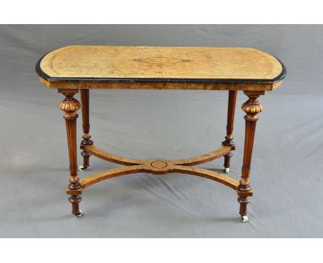 A MID VICTORIAN BURR WALNUT, INLAID AND EBONISED RECTANGULAR OCCASIONAL TABLE, with rounded ends, on four moulded and fluted 