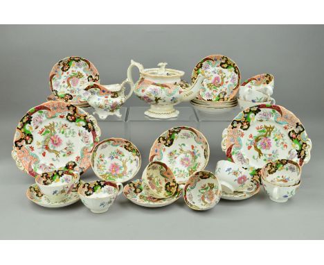 AN EARLY VICTORIAN BONE CHINA TEA SERVICE, possibly Masons, decorated with a printed and painted Japanese inspired design of 