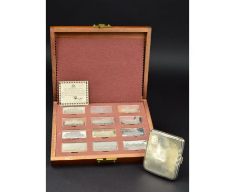 A CASED SET OF TWELVE ELIZABETH II BIRMINGHAM MINT 'ROYAL PALACES' STERLING SILVER INGOTS, limited edition No.128/3000, in fi
