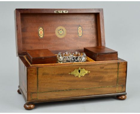 AN EARLY 19TH CENTURY MAHOGANY AND BRASS INLAID TEA CADDY, of rectangular form, the hinged lid opening to reveal Tunbridge st