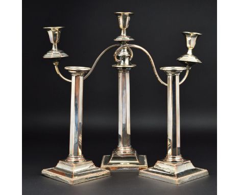 A LATE 19TH CENTURY SILVER PLATED THREE LIGHT CANDELABRUM AND MATCHING PAIR OF CANDLESTICKS, beaded rims, octagonal columns, 