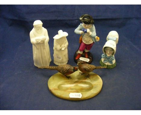 A Royal Worcester candle snuffer together with two others and a continental figurine etc.